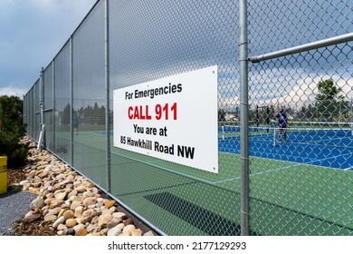 Calgary Alberta Canada, July 09 2022:  Emergency Location Sign At A Public Pickle Ball Park In The North West Community Of Hawkwood.