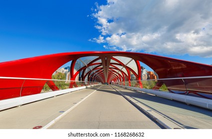 Calgary, Alberta Canada - July 11, 2018: View of Peace Bridge at Calgary AB Canada on a sunny afternoon. Peace Bridge is a pedestrian bridge, designed by Spanish architect Santiago Calatrava.