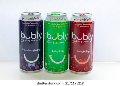 Calgary, Alberta, Canada. Jun 24, 2022. Cans Of Bubly Blackberry, Lime And Cherry Favor Sparkling Water Of 473mL