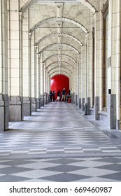 Calgary. Alberta. Canada.  June 29 2017.  Red Ball Project In Calgary Stephen Avenue's Hudson Bay.  Pillars As Leading Lines To The Red Ball.