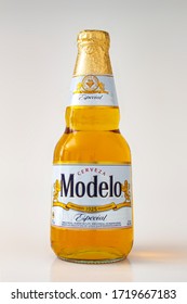 Calgary, Alberta, Canada. May 1, 2020. Modelo Especial Beer Bottle Clear Bright Yellow Colour On A White Background