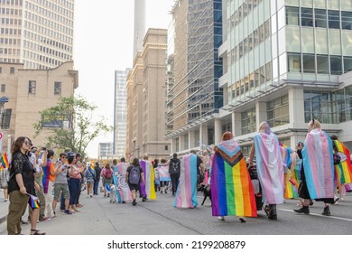 Calgary, Alberta, Canada. Sep 4, 2022. People Walking With 2SLGBTQ+ Flags On During Calgary Pride Parade In Downtown, Calgary.    