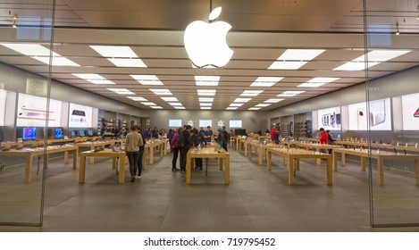 CALGARY, ALBERTA, CANADA - SEPTEMBER 21, 2017: Apple Store Front In Market Mall Shopping Center As Shoppers Browse Latest Electronic Devices 