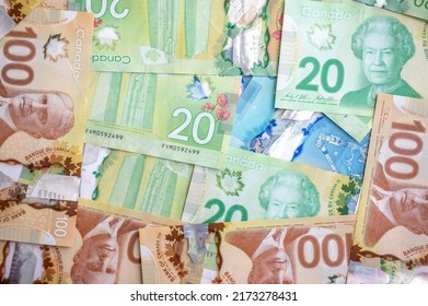 Calgary, Alberta - June 29, 2022: Miscellaneous Canadian Currency Background.