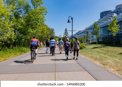 Calgary, AUG 3:  People Cycling Around Sien Lok Park On AUG 3, 2019 At Calgary, Canada