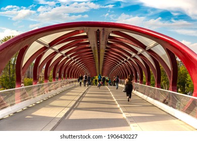 CALGARY, CANADA - APRIL 2, 2020: Peace Bridge across Bow river in Calgary in a sunny day, Canada