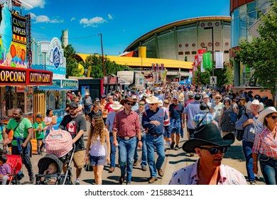 CALGARY, CANADA - Jul 12, 2019: The Calgary Stampede Annual Rodeo Festival In Canada With People Dressed As Cowboys