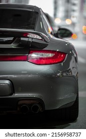 CALGARY, CANADA - Mar 30, 2022: Back End Profile Of A Grey Porsche Sports Car