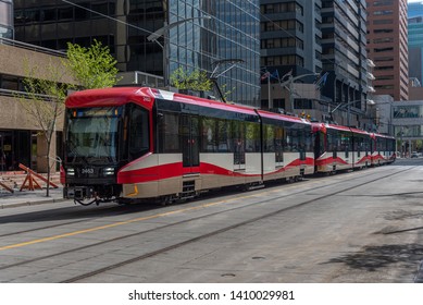 Calgary, Canada - May 26, 2019: C-Train In Downtown Calgary, Alberta. The C-train Is Calgary's Main Light Rail Transit Vehicle And Moves Over 300,000 People A Day