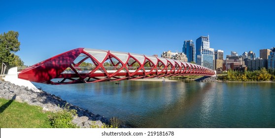 CALGARY, CANADA - SEPT 21: Panorama of the Peace Bridge on September 21, 2014 in Calgary, Alberta Canada. The pedestrian bridge spans the Bow River and was designed by Santiago Calatrava. 