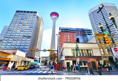 CALGARY, CANADA -SEPTEMBER 29 ,2017: Pedestrians walking past retail outlets along Stephen Ave in Autumn, Calgary, Alberta. Stephen Ave is a famous pedestrian mall in downtown Calgary