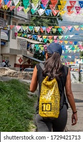 Cali Colombia 01-05-2020 Hispanic Girl Walking With Backpack In Colombian Streets