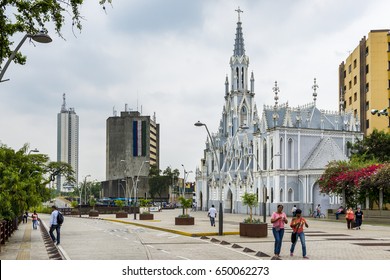 Cali, Colombia - February 6, 2014: People in a street in front of the La Ermita Church in city of Cali, Colombia