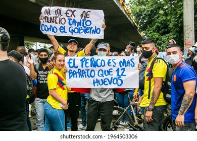 Cali, Valle del Cauca, Colombia - april 28 of 2021: protesters participating in the national strike agains the goverment tax reform