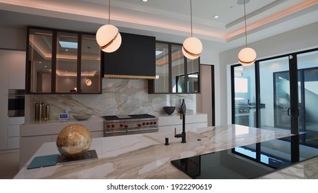 California, 22 February 2021: Luxurious And Bright Kitchen Interior With Elegant Furniture Inside Of Spacious Residential Mansion. Modern Concept For Interior Design And Architecture.