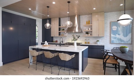 California, 24 February 2021: Luxurious And Bright Kitchen Interior With Elegant Furniture Inside Of Spacious Residential Mansion. Modern Concept For Interior Design And Architecture.