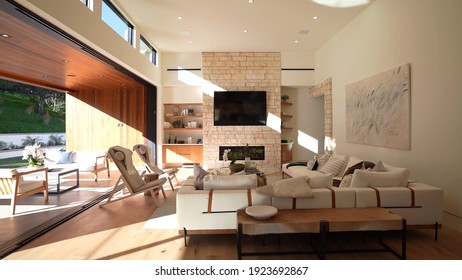 California, 24 February 2021: Spacious Big Living Room Of Luxurious Estate With Wooden Elements. Modern Mansion Interior With With A New Stylish Furniture Design Concept For Residential Home.