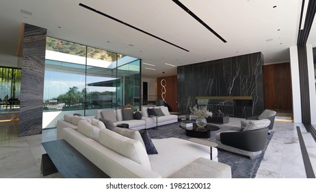 California, 29 May 2021: Spacious Big Living Room Of Luxurious Estate With Wooden Elements. Modern Mansion Interior With With A New Stylish Furniture Design Concept For Residential Home.