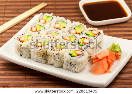 California roll maki sushi on a white plate. Stockfoto © 