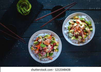 California Roll Sushi Bowls On Dark Background, Top View