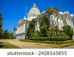 California State Capitol building on a sunny day in Sacramento. The California State Capitol stands as a historic edifice, combining neoclassical architecture with the functions of state government.