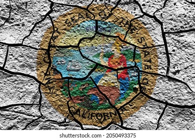 California state Seal flag of United States on a mud texture of dry crack on the ground