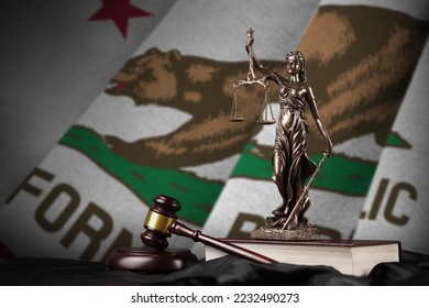 California US state flag with statue of lady justice, constitution and judge hammer on black drapery. Concept of judgement and punishment - Shutterstock ID 2232490273