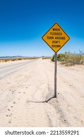 California, USA - 06.08.2022:Turn Around, Don't Drown Road Sign, Mojave Desert, California