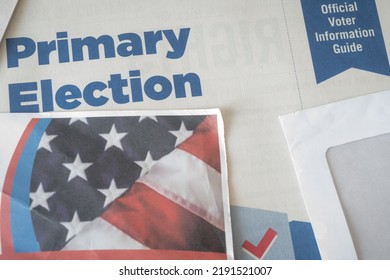 CALIFORNIA, U.S.A. - Aug 11th 2022: Official Voter Information Guide Paper Mail Material With American Flag And Ballot Box Illustration.