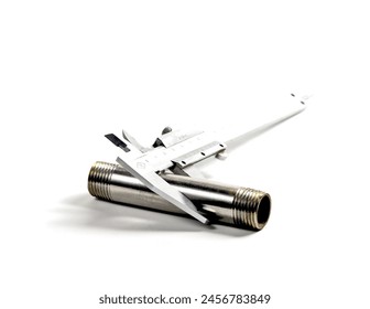 caliper sizing a stainless steel pipe on white background - Powered by Shutterstock