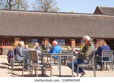 Calke, Derbyshire, UK 04 21 2022 People Sitting Outside A Cafe