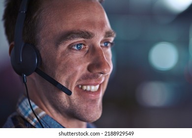 Call center agent smiling, looking happy and friendly while working in an office alone at work. Face of a positive, thinking and professional customer service agent, helpdesk operator or employee - Shutterstock ID 2188929549