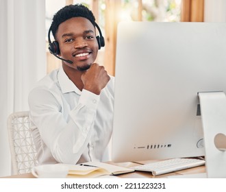 Call Center, Communication And Black Man Talking With People On The Internet And Working In Sales For Telemarketing Company. Portrait Of An African Customer Service Worker Consulting On A Pc Online