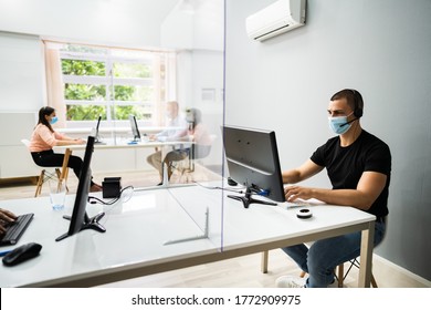 Call Center Customer Service Agents Wearing Face Masks - Powered by Shutterstock