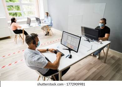 Call Center Customer Service Agents Wearing Face Masks - Powered by Shutterstock