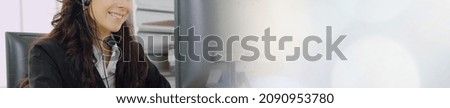 Call center or customer support agent in broaden view panorama banner wearing headset while working at office to support remote customer or colleague on telephone video conference call