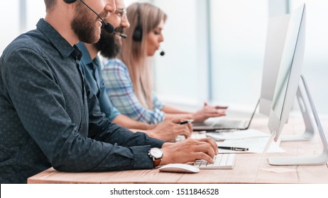 Call Center Employees Work On Modern Computers