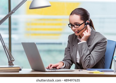 Call center operator in business concept - Shutterstock ID 489497635