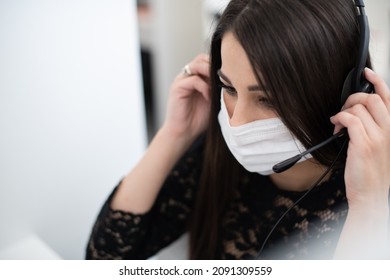 Call Center Operator In Medical Mask