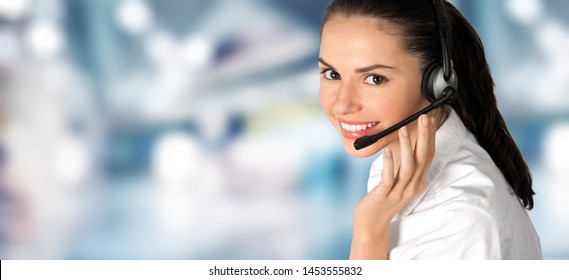 Call Center Service. Photo Of Customer Support Or Sales Agent. Female Caller Or Receptionist Phone Operator. Copy Space For Some Text, Advertising Or Slogan. Help Line Answering And Telemarketing