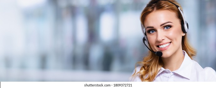 Call Center Service. Portrait Of Customer Support Or Sales Agent. Caller Or Receptionist Phone Operator. Copy Space Area. Helping, Answering, Consulting. Blond Girl Over Blurred Office Background.	
