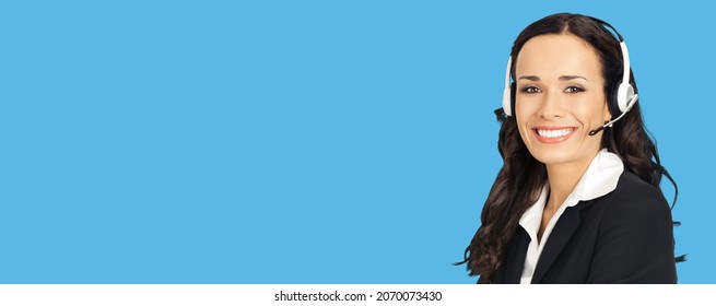 Call Center Service. Portrait Of Customer Support Phone Sales Operator In Headset, Isolated Over Bright Blue Background With Copy Space Area For Text, Imaginary, Product Or Slogan. Skype Zoom Video.