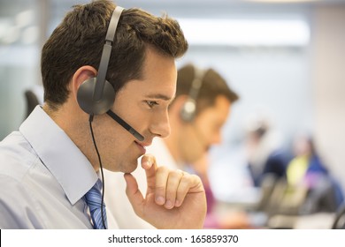 Call Center Team In The Office On The Phone With Headset