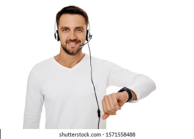 Call Center Worker Isolated On White Background. Smiling Friendly Customer Service Representative Using Headset And Showing Watch. Save Your Time - Call Customer Service Support