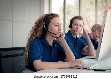 The Call Centre Staff Worker Team At Call Center Service Desk Consultant Getting Upset Because Customers Complain, Feeling Sad, Tired And Exhausted, Unhappy Worker Concept