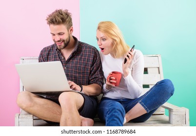 Call options to buy now. Man girl create content blog social network. Couple surfing internet content social network. Shocking content. Couple content creators work with laptop and smartphone.