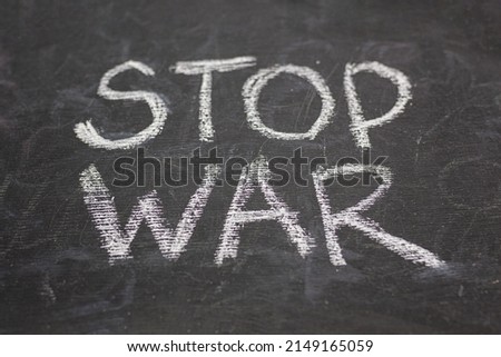A call for peace and an end to the war. Chalk board with inscription No war. Stop war.