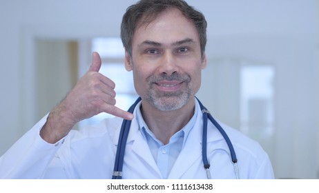 Call Us Gesture By Doctor In Hospital