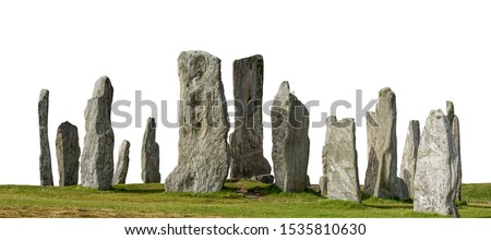 Callanish Stones (Scotland, UK) isolated on white background. It is an arrangement of standing stones placed in a cruciform pattern with a central stone circle. 