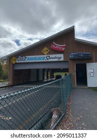 Callicoon, NY, USA, 10.10.21 - The Entrance To The Villa Roma's Monaco Speedway. Inside Of The Garage Are The Parked Go Karts And Around It Is The Racetrack.